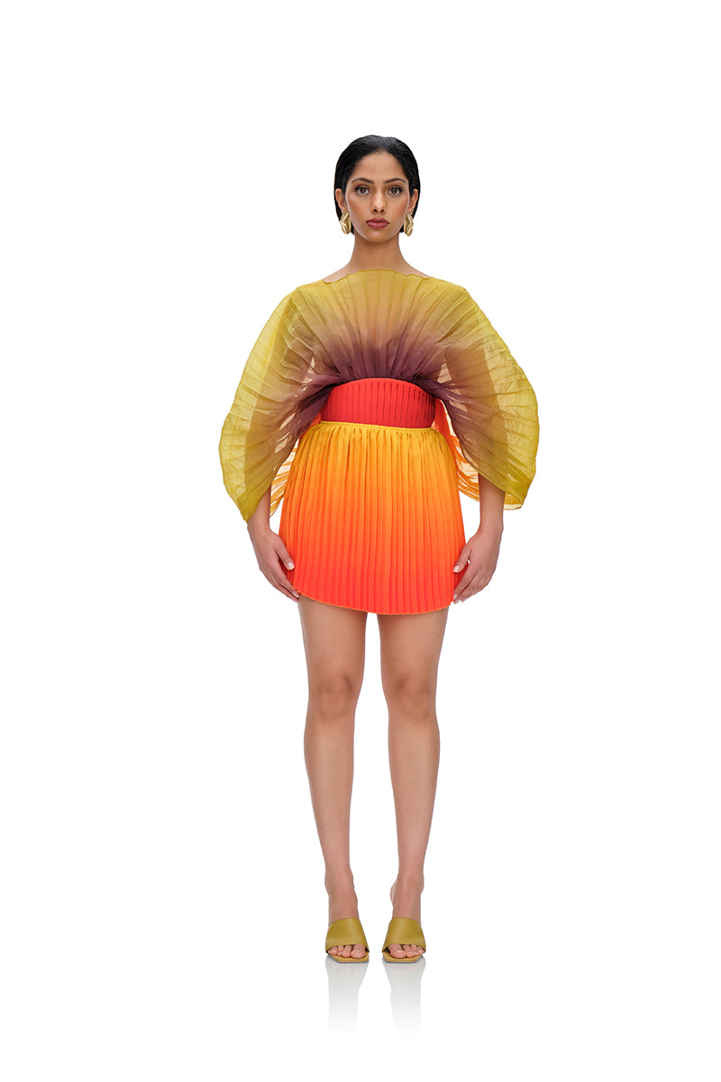 KATA PLEATED MINI SKIRT IN ADWA RED PRINT