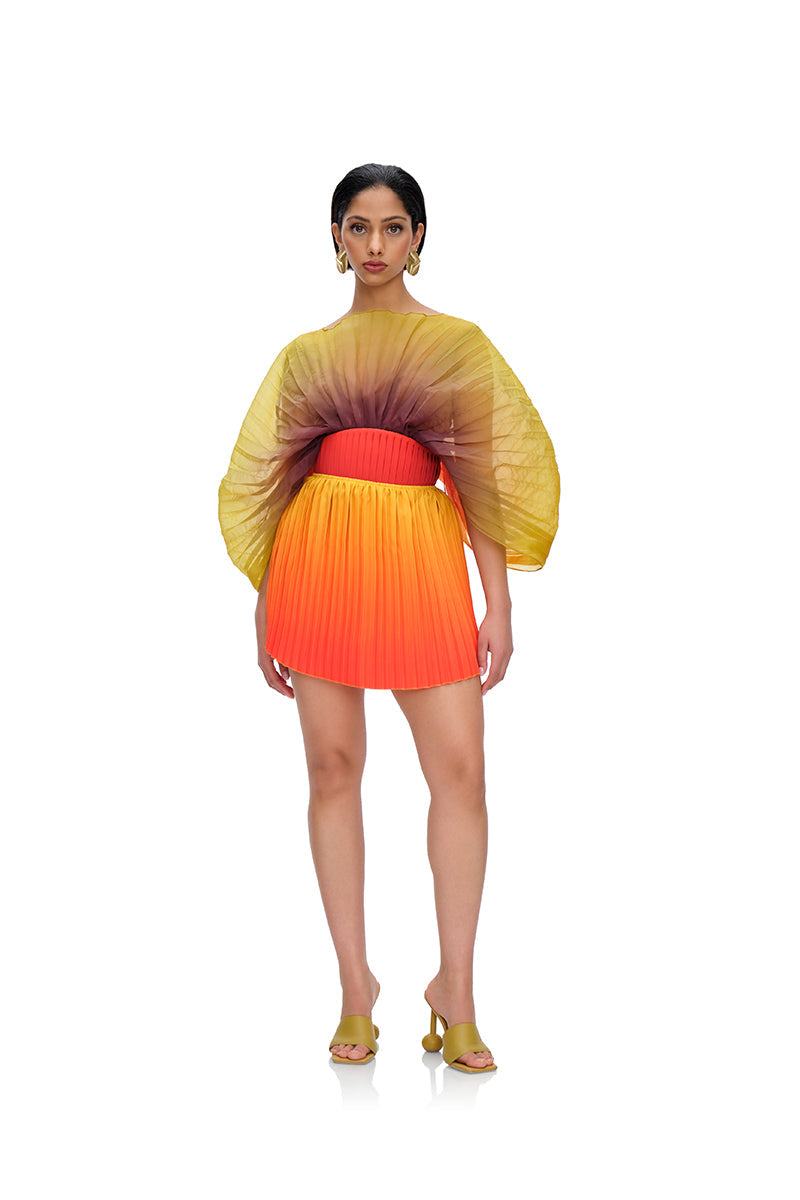 KATA PLEATED MINI SKIRT IN ADWA RED PRINT