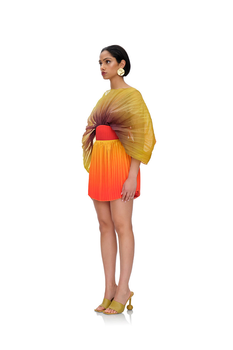 KATA PLEATED MINI SKIRT IN ADWA RED PRINT