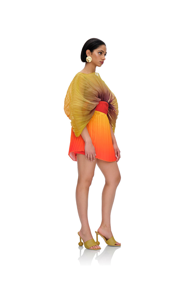 KATA PLEATED MINI SKIRT IN ADWA RED PRINT