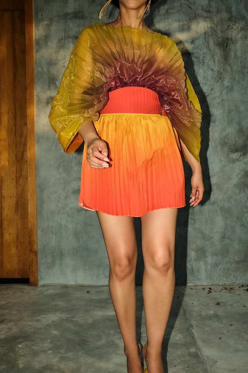 KATA PLEATED MINI SKIRT IN ADWA RED PRINT